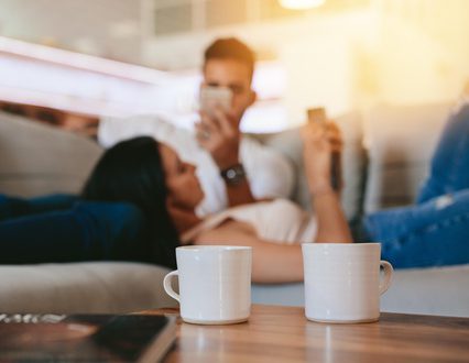 Couple relaxing on couch